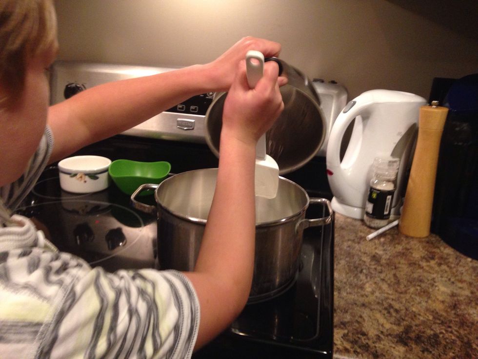 Then you put all of the ingredients into the pot except for the bar of butter,vanilla extract,and salt then when it started boiling you put in the candy thermometer until it gets to 250 f and stir it.