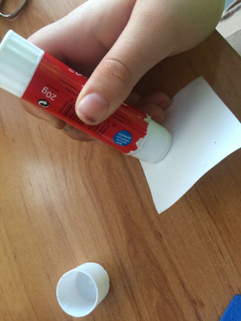 Then you put some glue on the back.