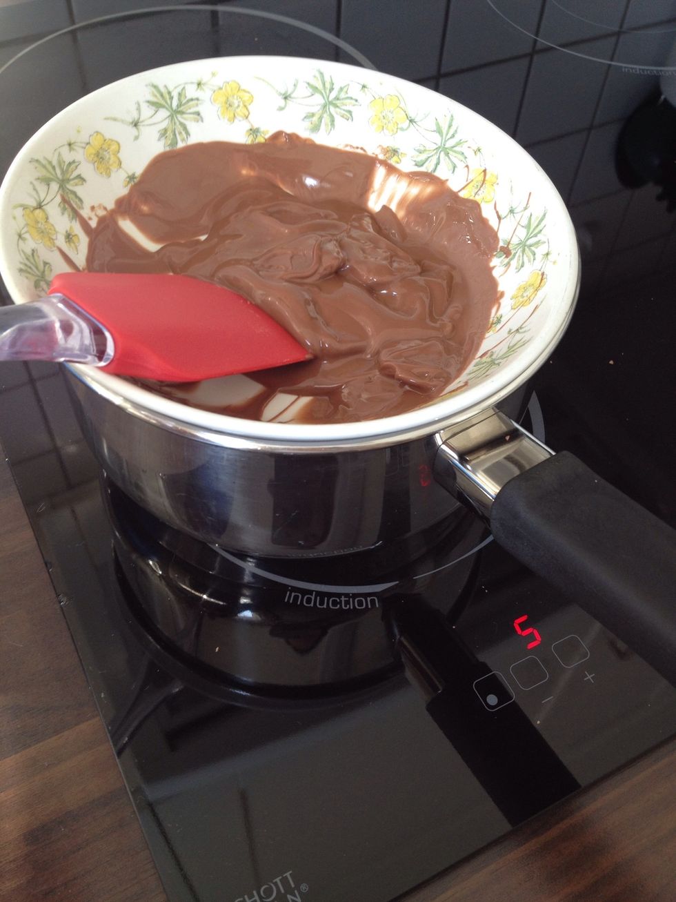 Then you put your bowl with chocolate over the boiling water until it's melted