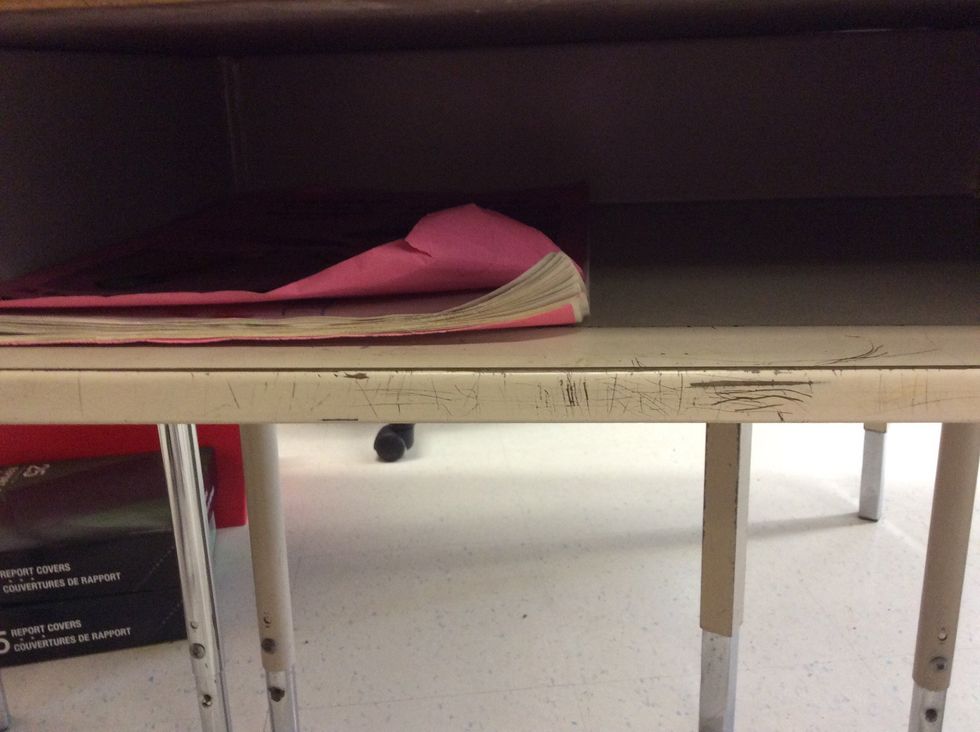 Then you put your pink book in your desk