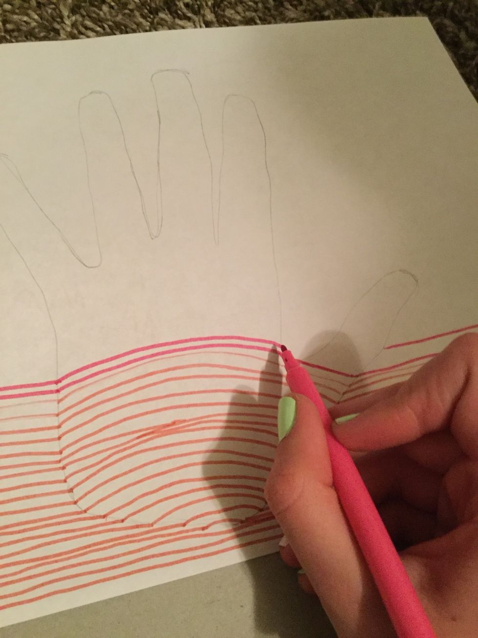 Then you're going to draw a hump, an straight line until you get to the finger, then another hump over that, and another straight line.
