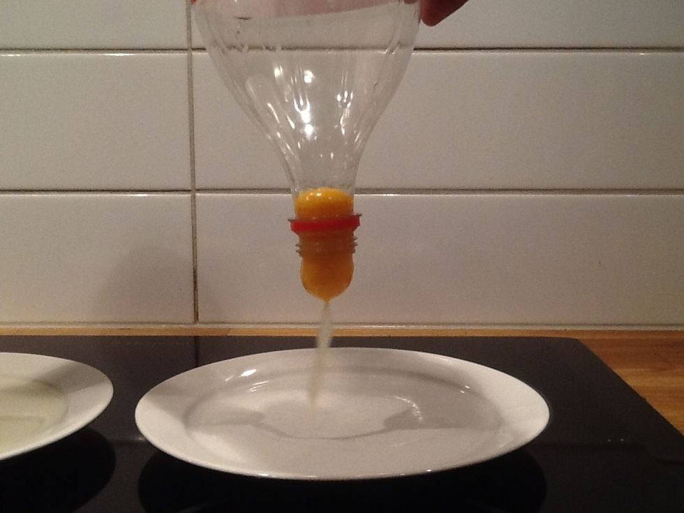 Then you release your hand of the bottle and push out the egg.