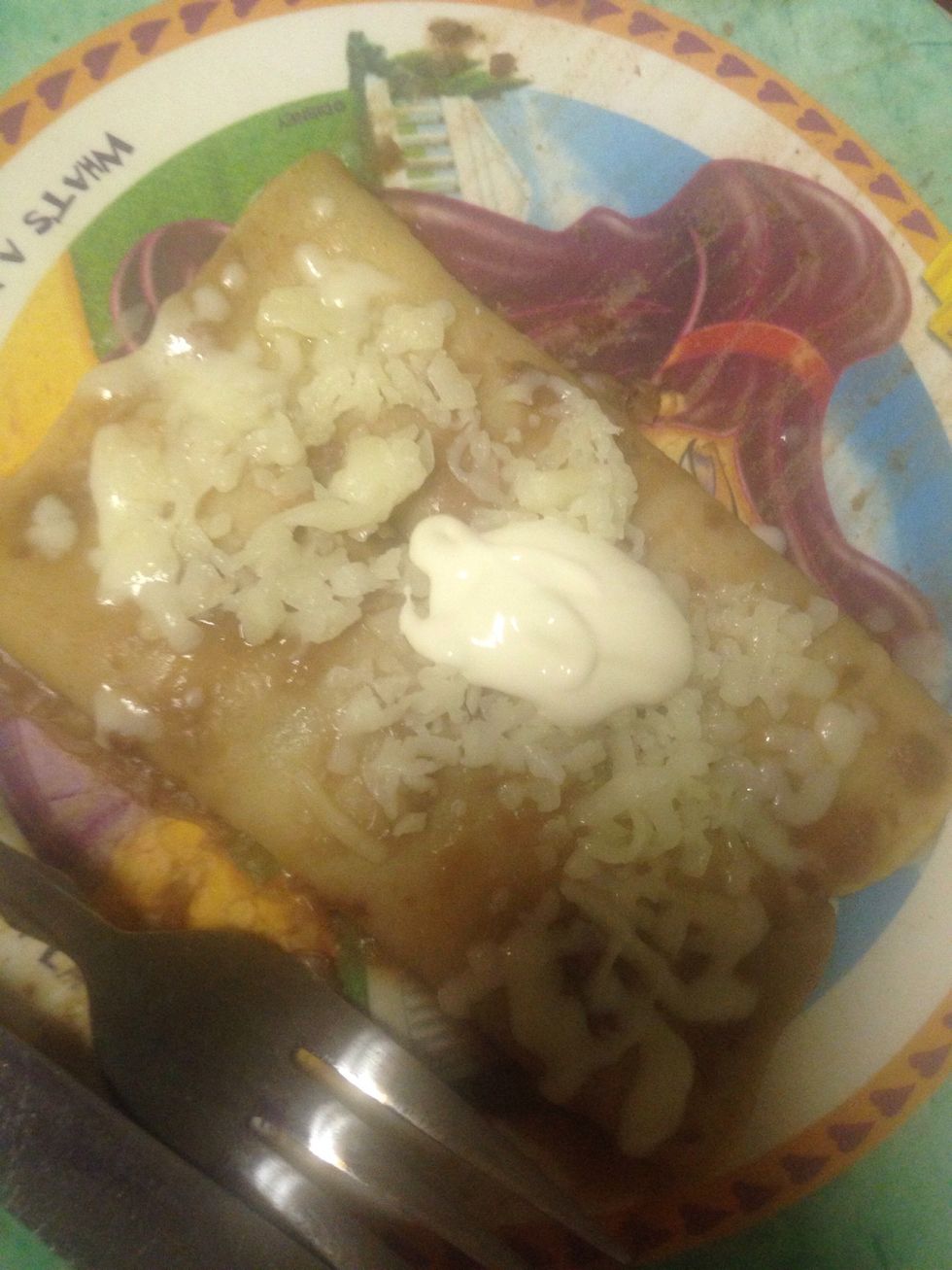 Then you roll them up add some more cheese on top and some sour cream if you like