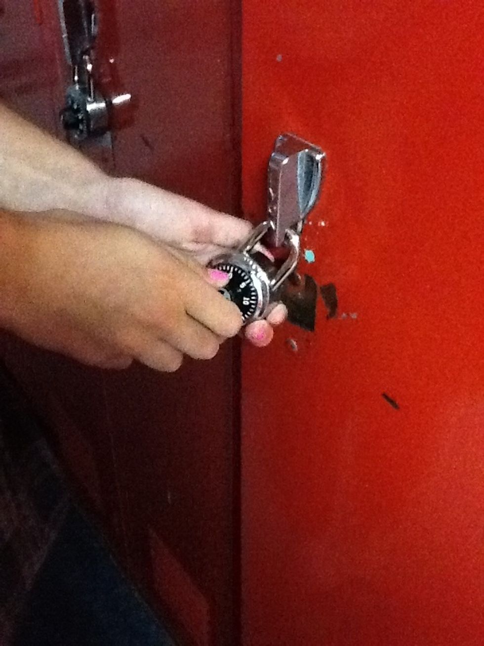 Then you rotate the lock to the left and stay at the number