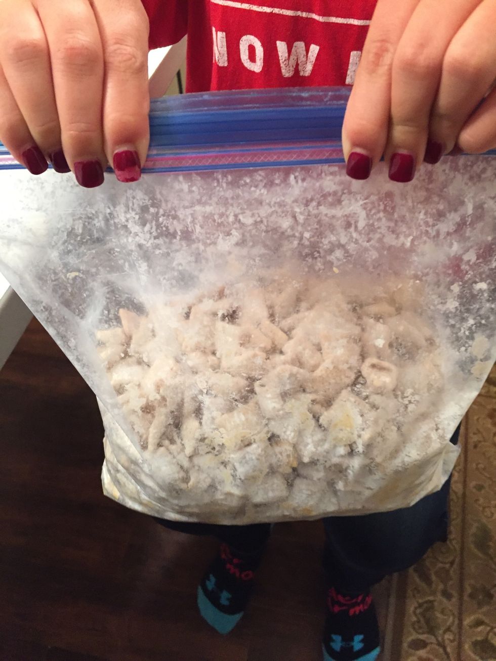 Then you shake the bag until the chex is coated with the confectioners sugar.