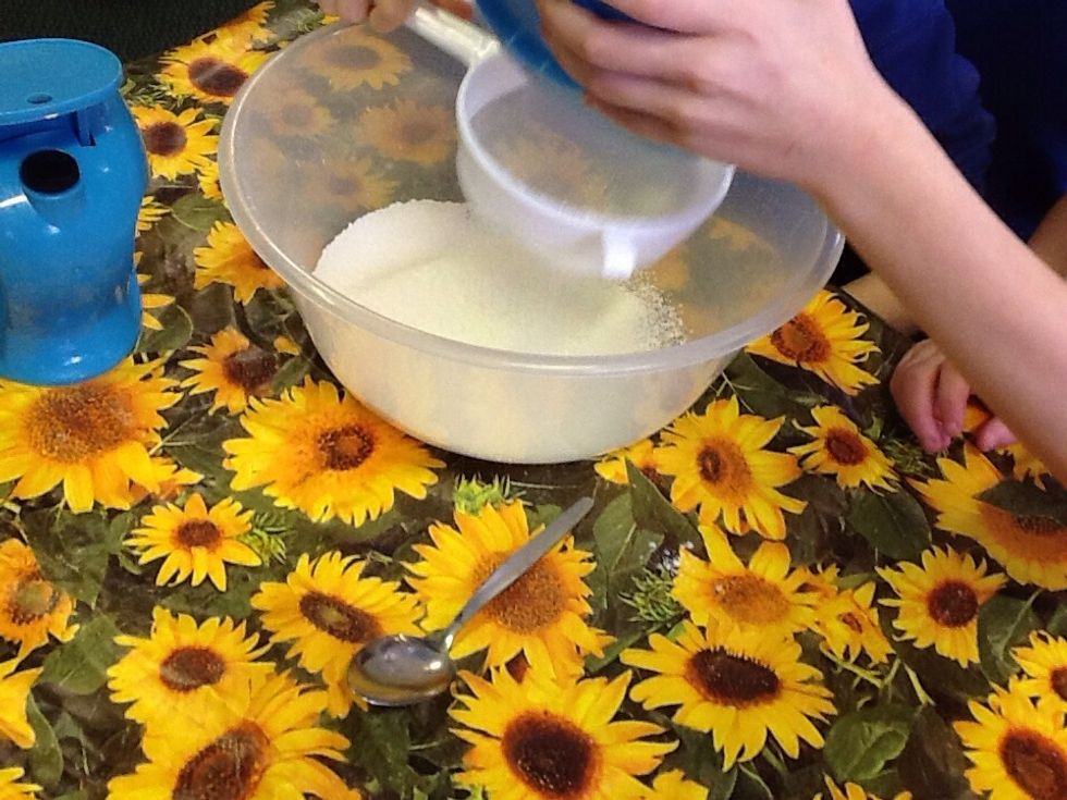 Then you sieve the flour in to the bolw.
