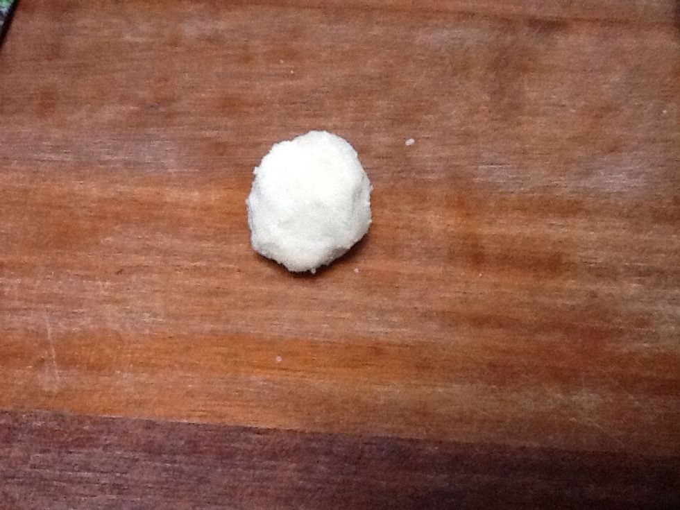 Then you take the dough and roll small balls of it