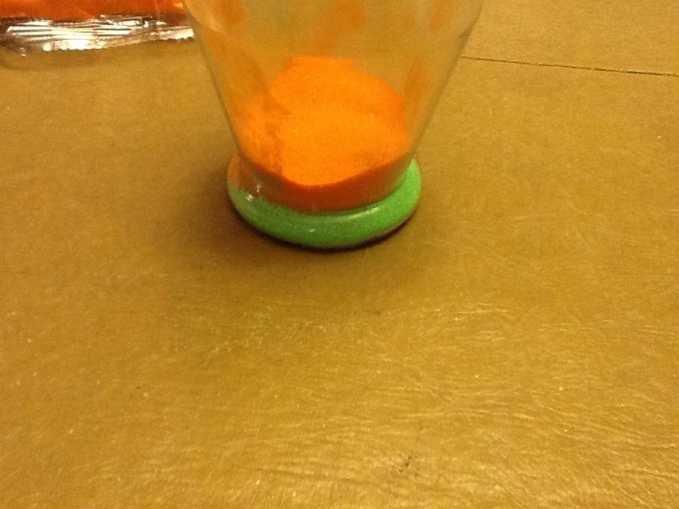 Then you take your second color and pour some of the sand in and you keep doing this (you can add different colors as you go) till you get to the top.
