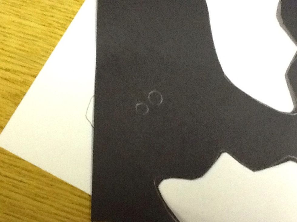 Then you trace the pupil two times to make two of them.