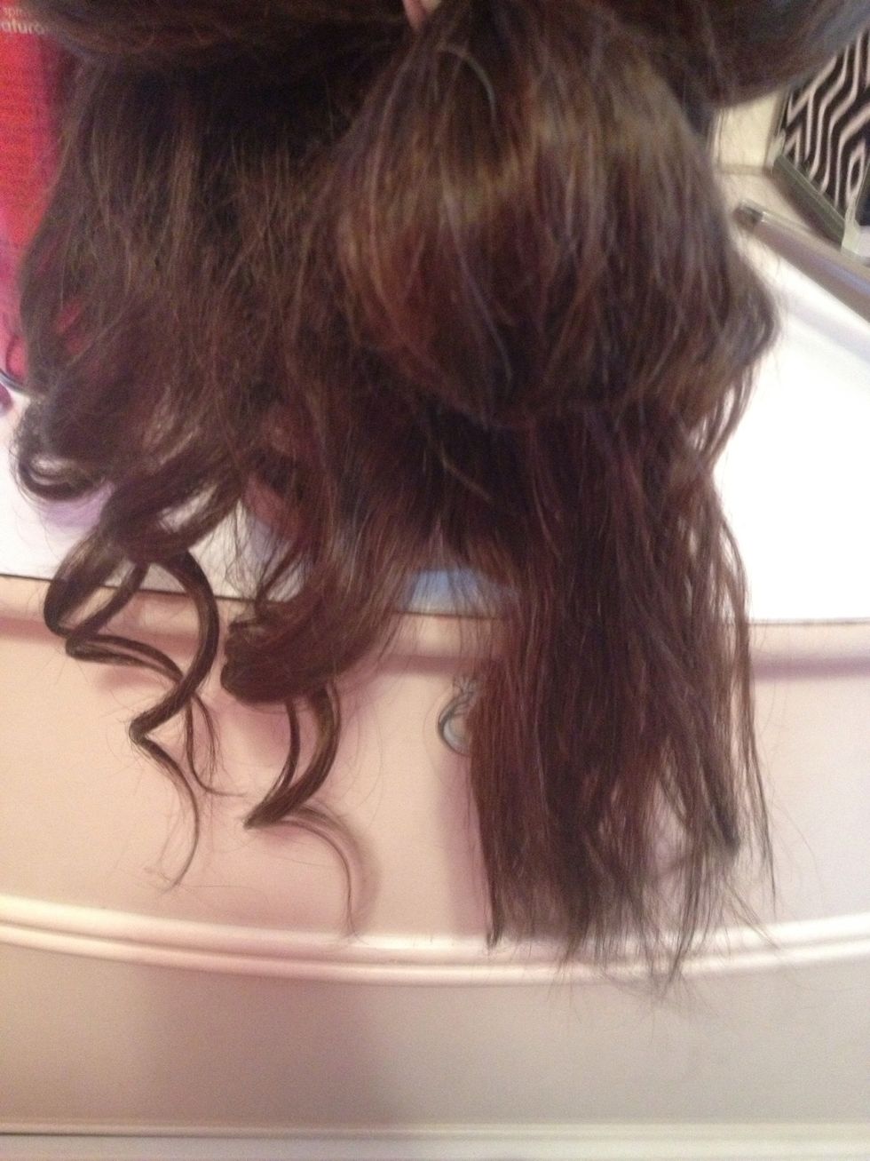 Then you untie and brush out the other bottom section. Be careful not to brush the already curled pieces of hair!