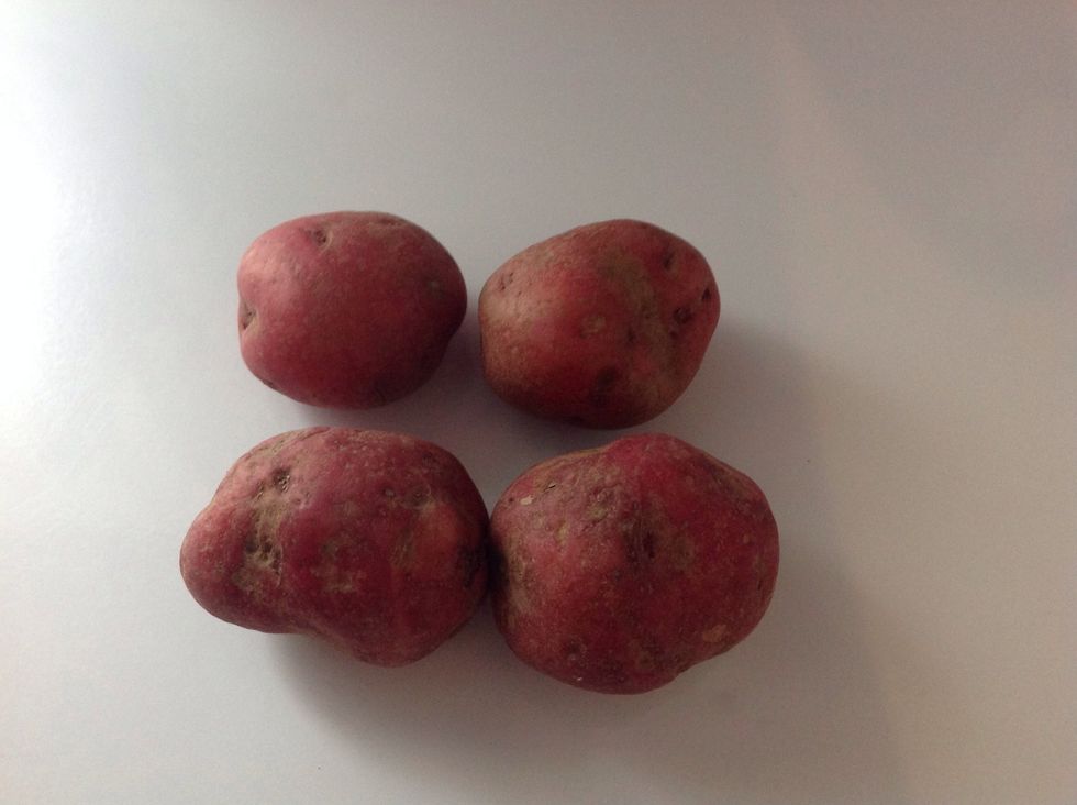 Then you want to get your four medium sized potatoes, or however many you want.