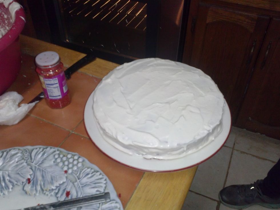 Then you will frost the top and sides of the cake.