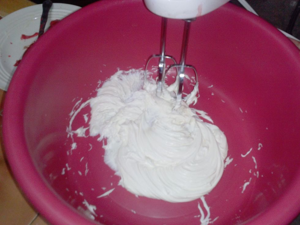 Then you will make the frosting. You will beat the cream cheese with the electric mixer or hand mixer.