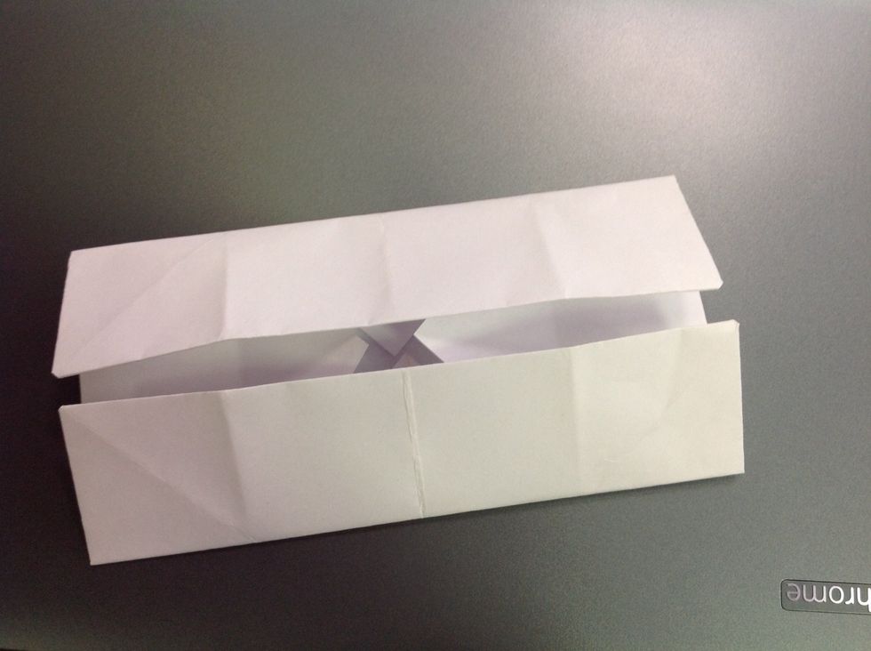 Then, you will need to unfold these last two folds, and fold to the middle from the opposite direction.