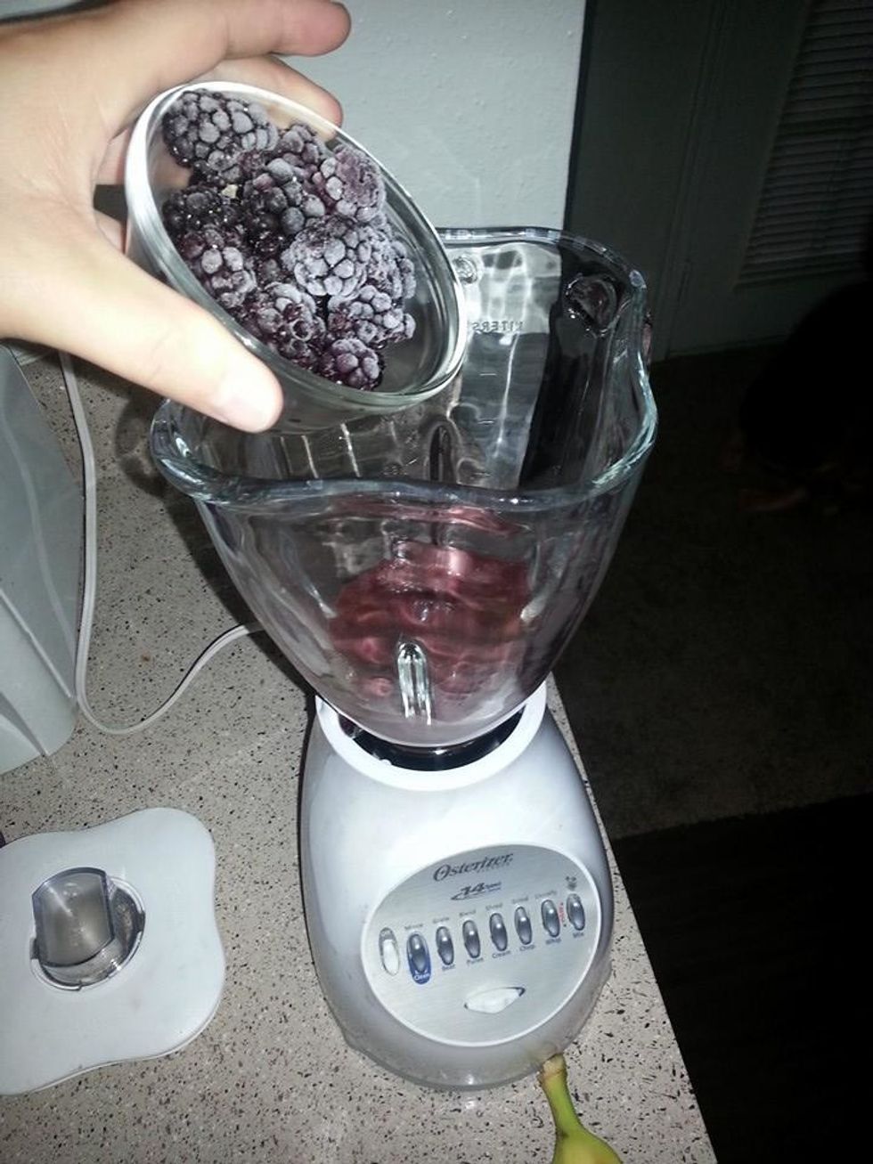 Then you will pour in your frozen blackberries (1/2 cup)
