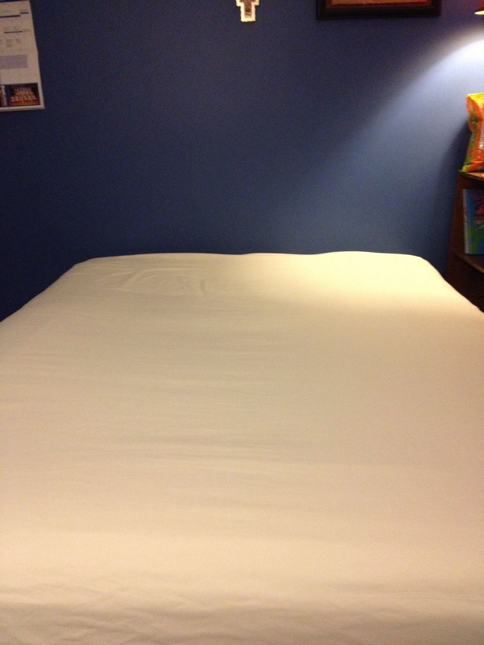 then you will put your sheet over your bed tightly