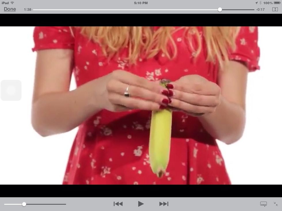 There are two sides of a banana. One flat side, and one curved side. Peel the banana on the flat side.