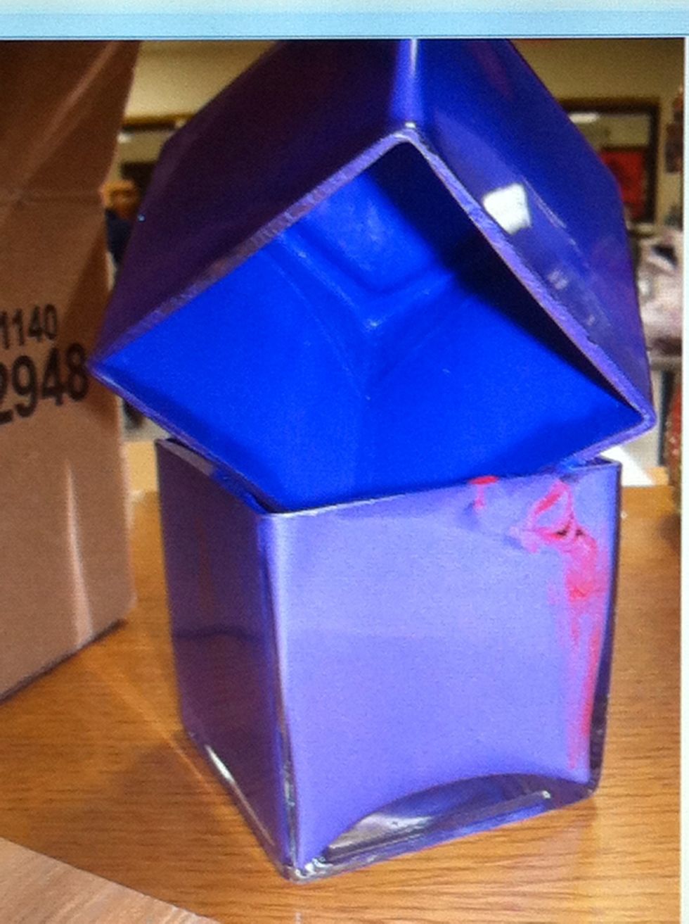 There is a ton of paint that needs to drip out of the vase. Don't waste this, use it on the next vase!