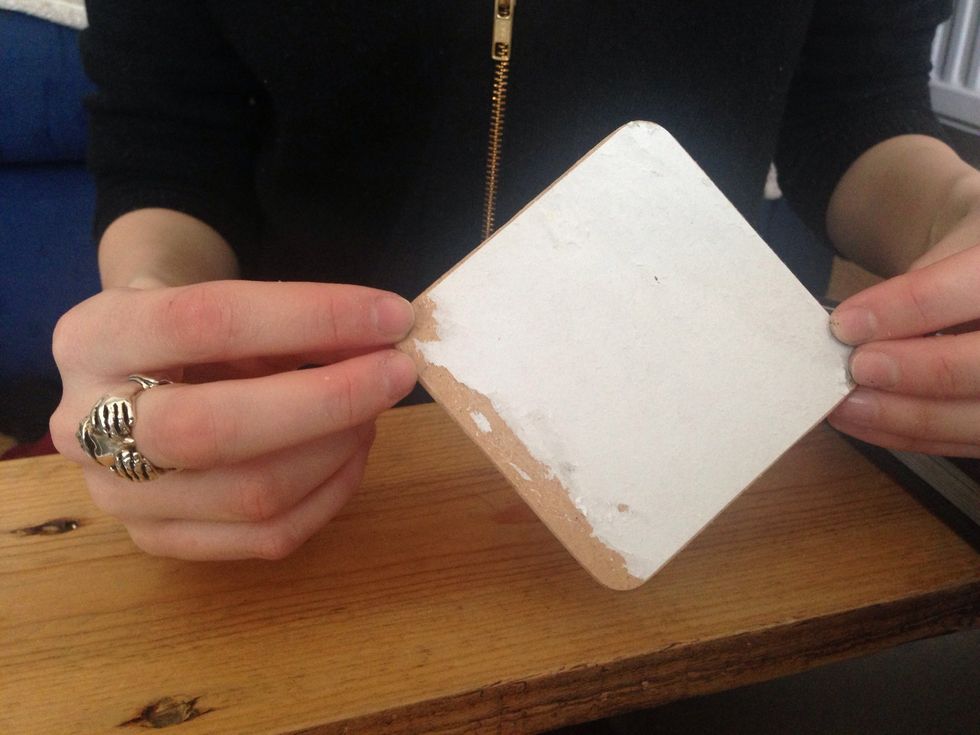 There may be a layer of paper left on the mat, you can leave this as it will give a nice a nice rough surface for the paint to stick to.