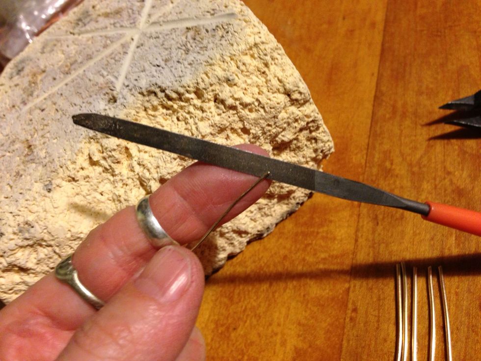 There must be new metal exposed for the solder to adhere. Lightly file the ends that have not just been cut.