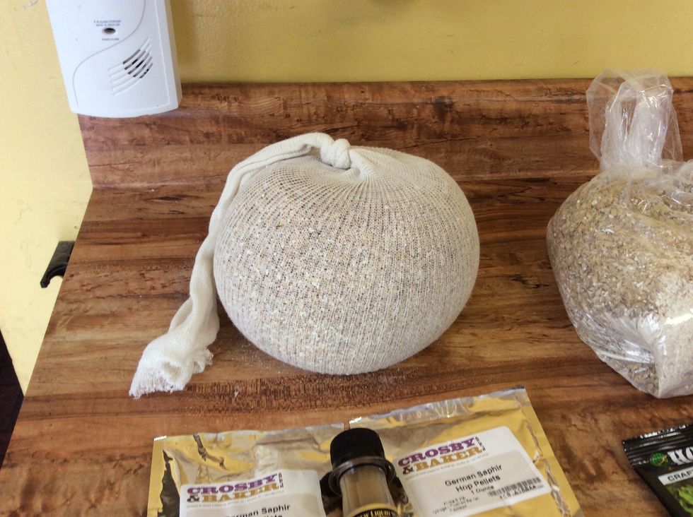 There's many methods to beer brewing. This is called BIAB, or brew in a bag. Rather than letting grains float free in the water, they're contained in a cheesecloth bag. Makes the process easier.