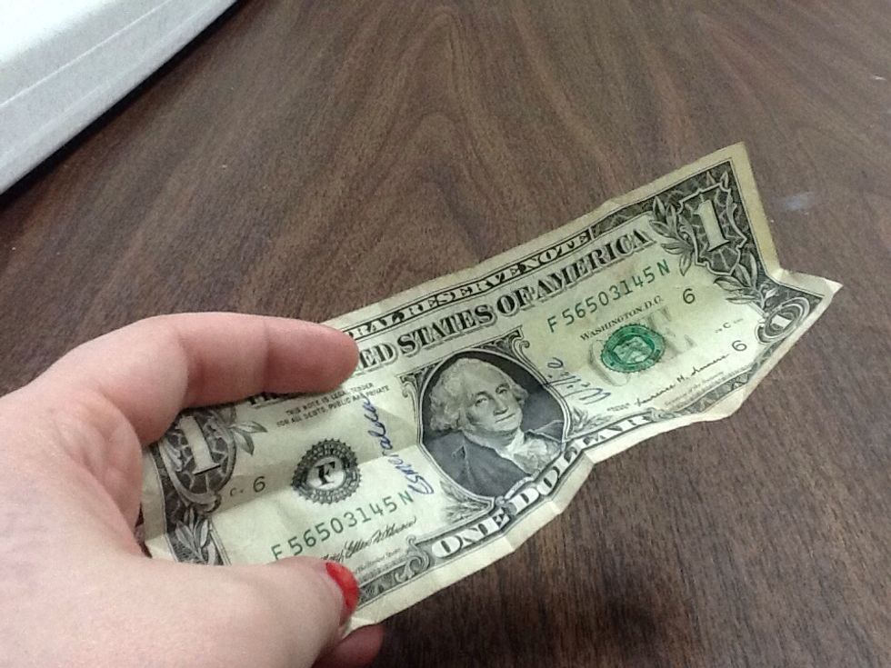 There should be a clear crease when you open the dollar back up and observe how Washington now looks like he has an underbite.