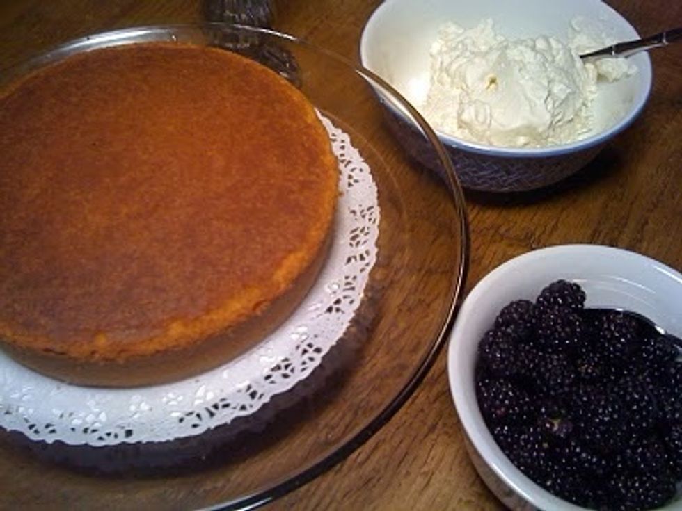 There should be about 2/3 cup of syrup left. Pour it into a small pitcher and refrigerate it until serving. Whip the cup of whipping cream, and rinse and dry the blackberries . Set them aside.