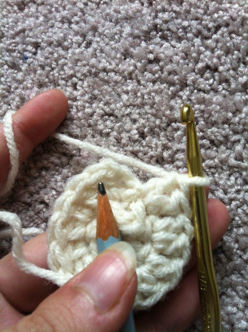 there we are. insert your hook in the first double crochet, yarn around and pull through both loops ...