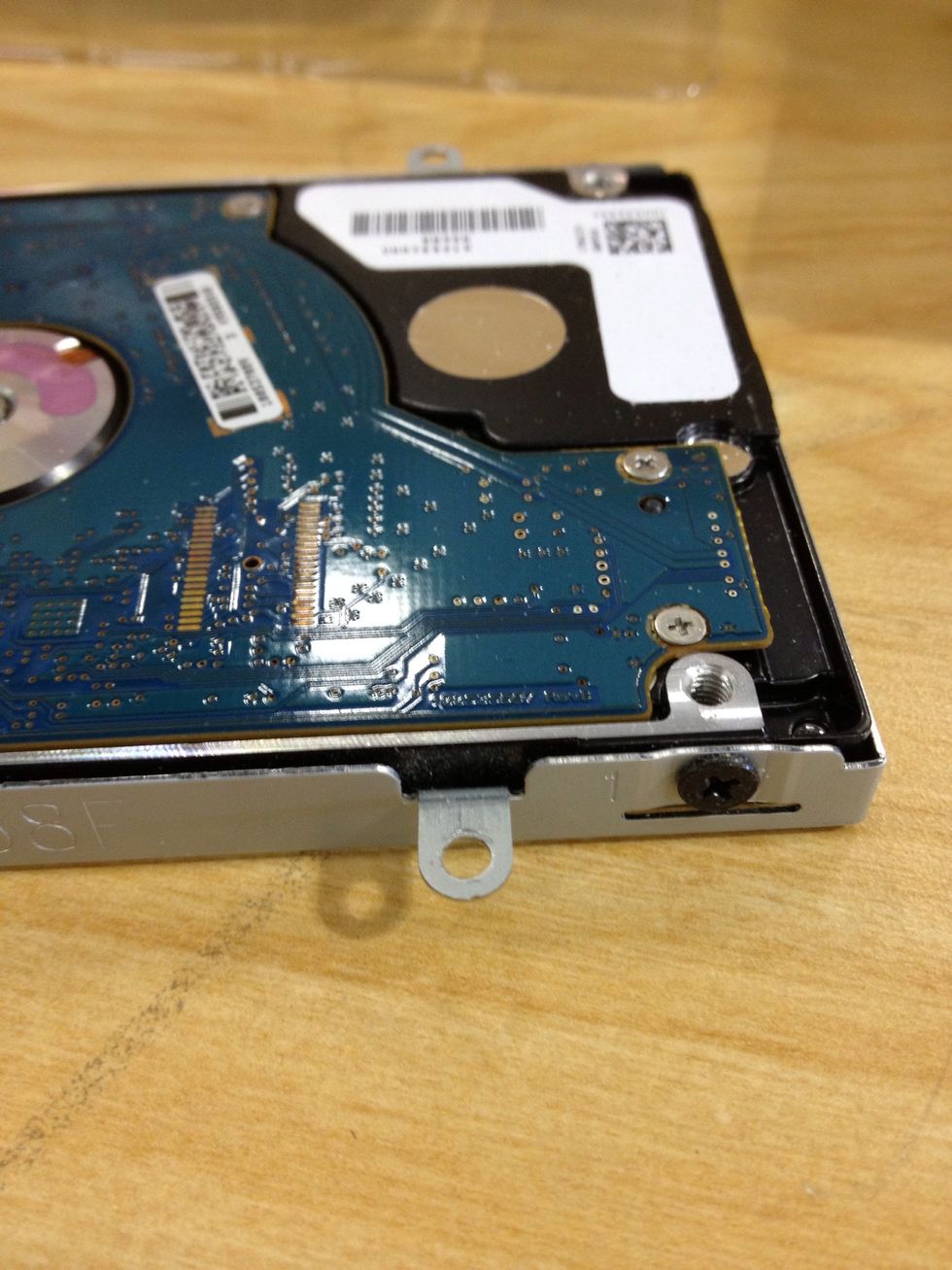 There will be a bracket around the hard drive with 4 more screws.