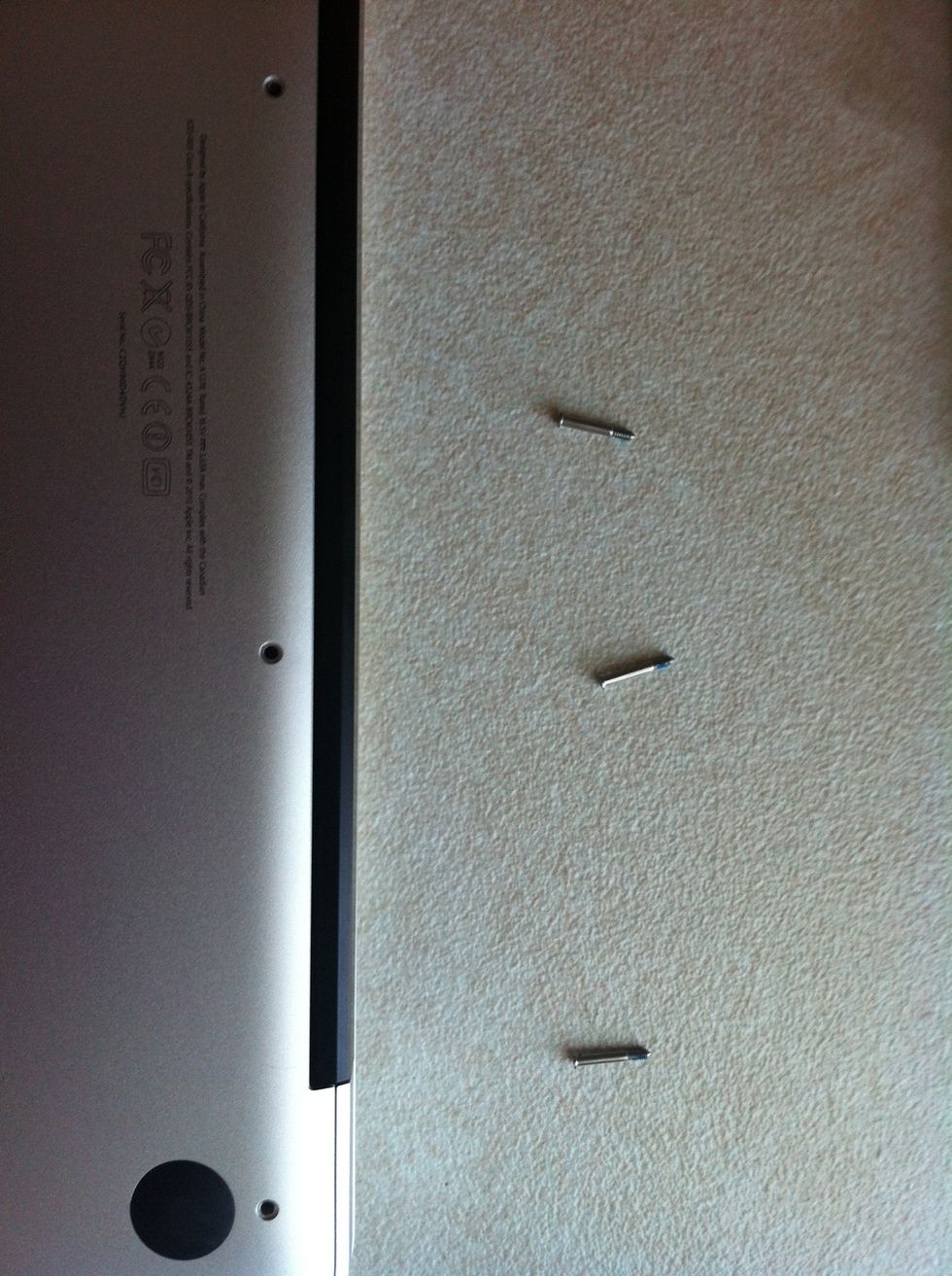 There will be only 3 long screws that will only fit the top end near the black bar as in picture