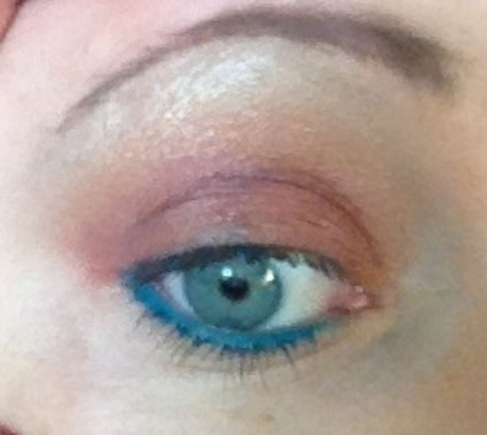 There you go a bold teal/aqua line along my waterline. I have to say not everyone is comfortable putting liner along this line but it's so striking when you do it.