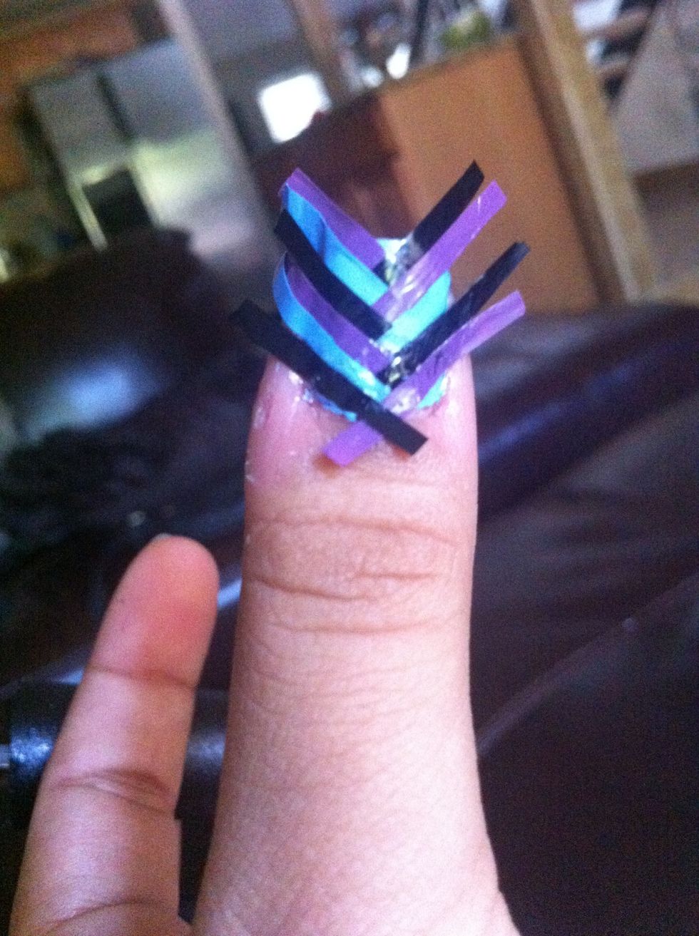 There you go! Now cut off the ends and file away carefully, WITHOUT TUGGING!