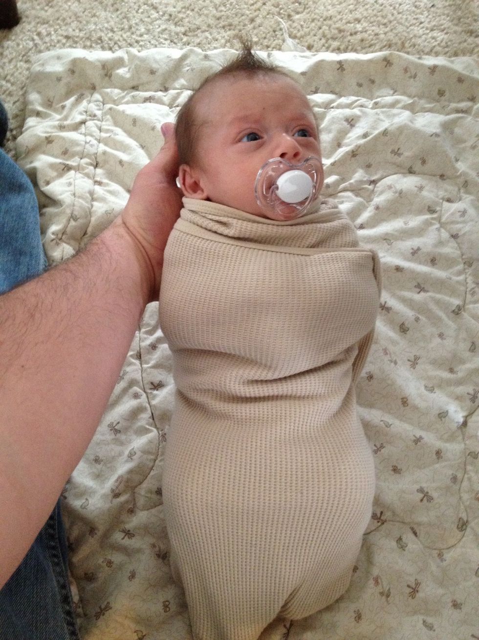 There you have a perfect Swaddle! Say hello to my little boy (twin #1) :) *Check out his Mohawk...haha! STAY TUNED FOR MORE BABY GUIDES!