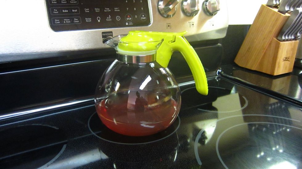 There you have it. The bold red of well brewed Cinnamon stick Tea. Now you will have to reheat before serving.
