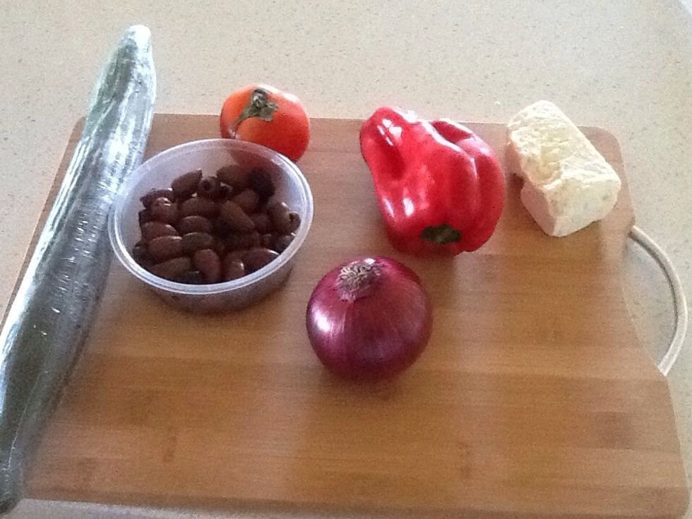 These are all the ingredients for a Greek Salad