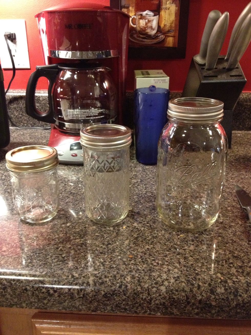These are Mason jars.  They come in various sizes.  Pictured above are 8 oz., 12 oz., and 32 oz. jars.  You can also find smaller (4 oz.) jars.