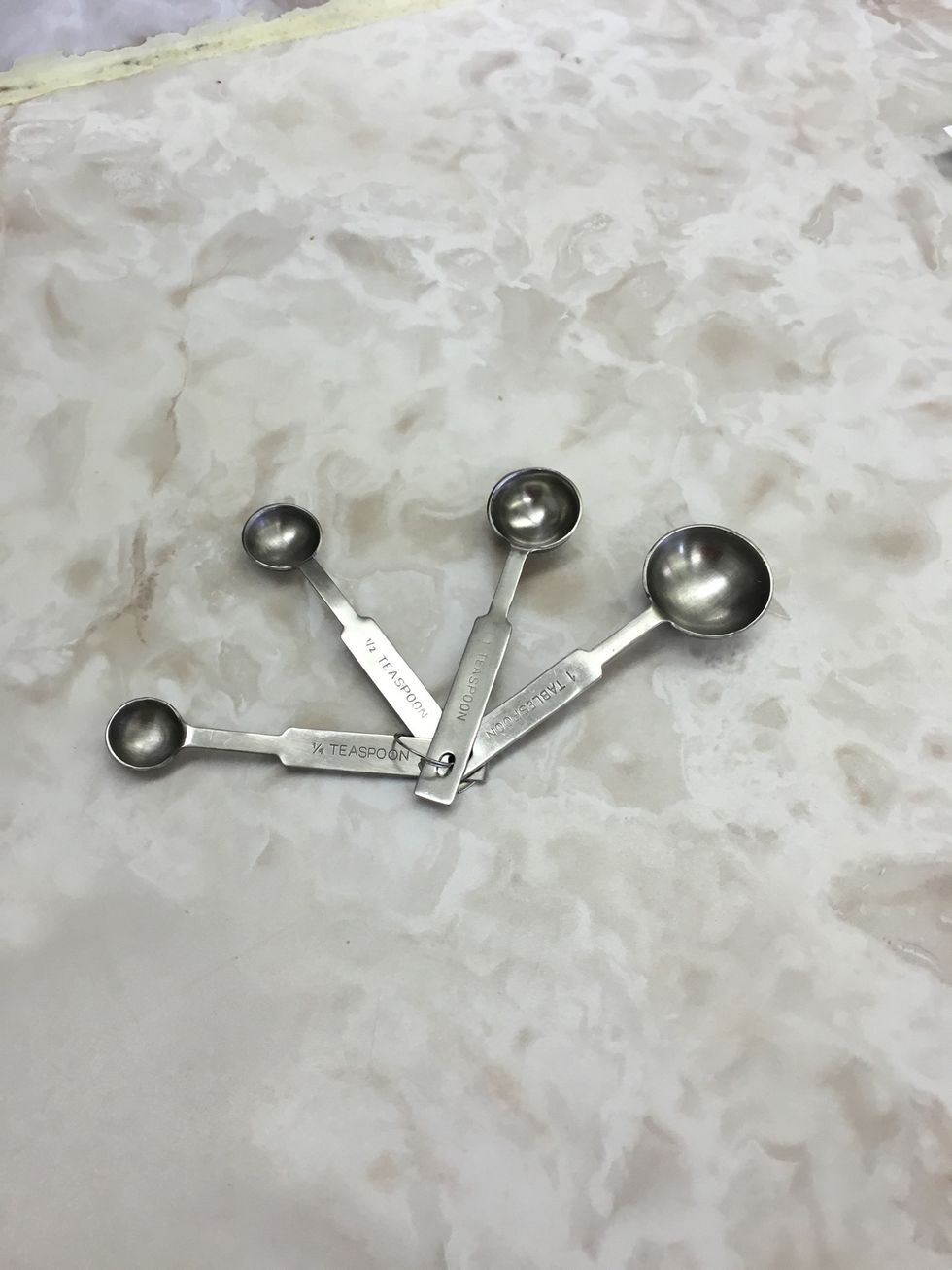 These are measuring spoons they can be used to measure dry items like salt and pepper or liquid items like vanilla or soy sauce