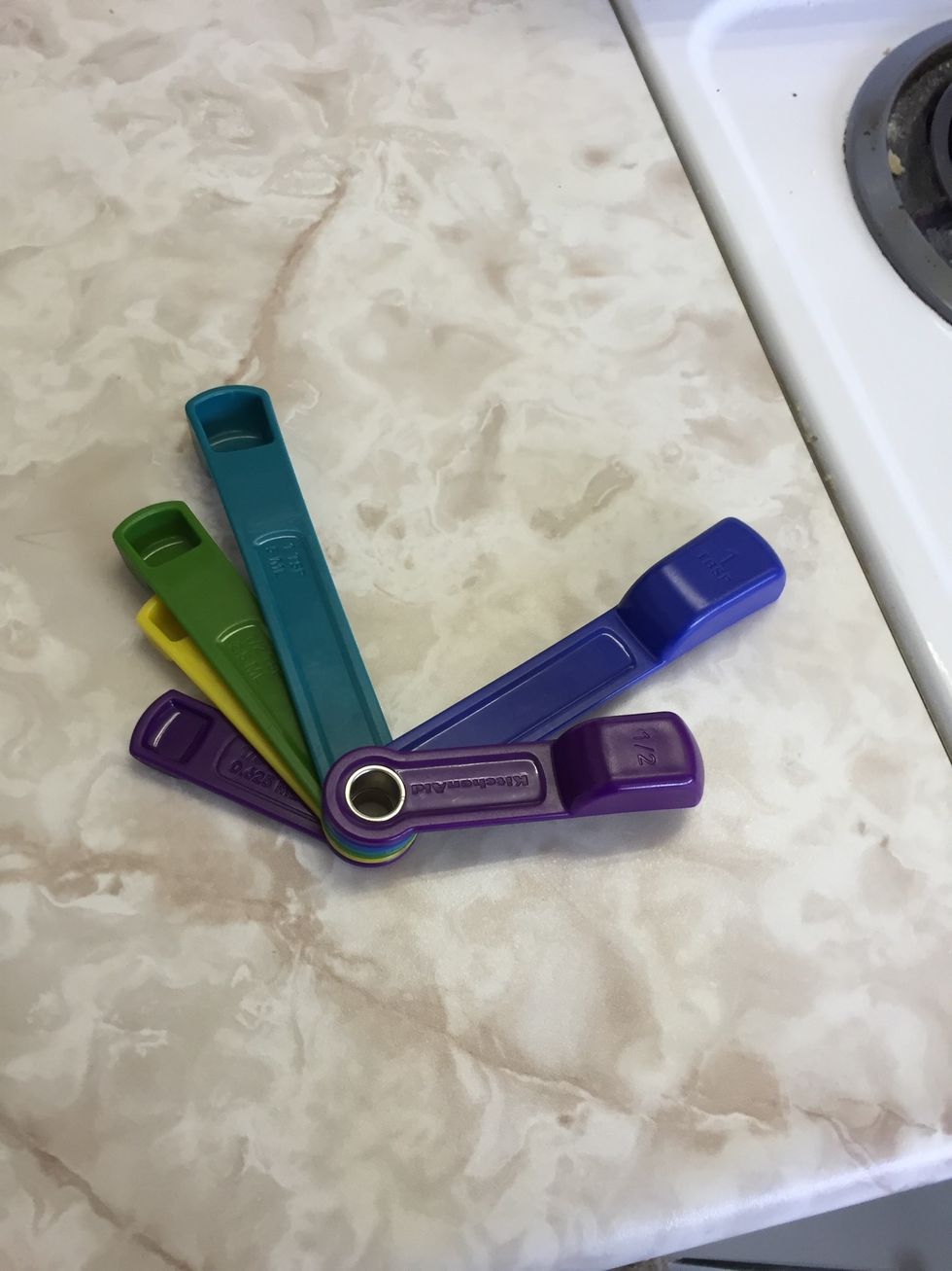 These are measuring spoons. You use them to measure tablespoons and teaspoons. I can use them when I measure how much vanilla extract I need.