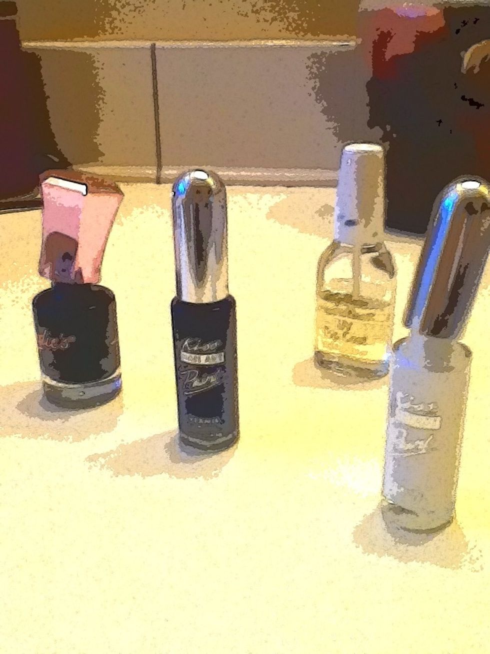 These are my polishes. I used Candie's Royal Navy, Kiss Nail Art Paint in White and Sparkly Dark Blue, and Sally Hansen's Hard As Nails UV Top Coat.