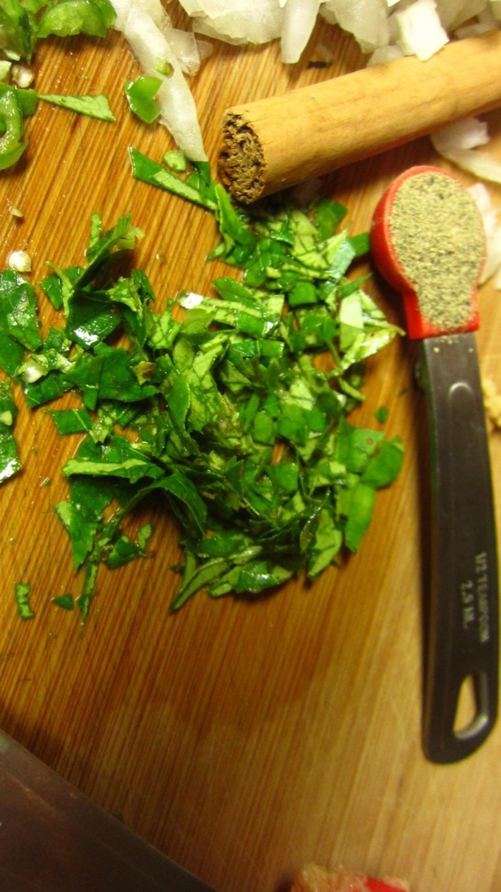 These are the curry leaves. Try to chop finer than this. It adds flavor and aroma. The trick to a good cutlet is what is inside.