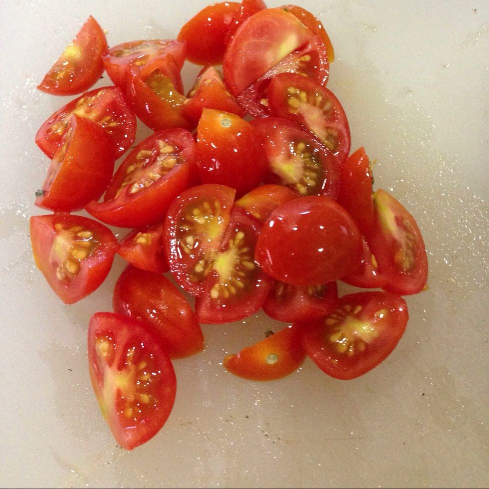 These are the grape tomatoes I neglected to photograph in the pan with the beans. Dump them in with your assorted herbs & whatnot, and stir it all up together.