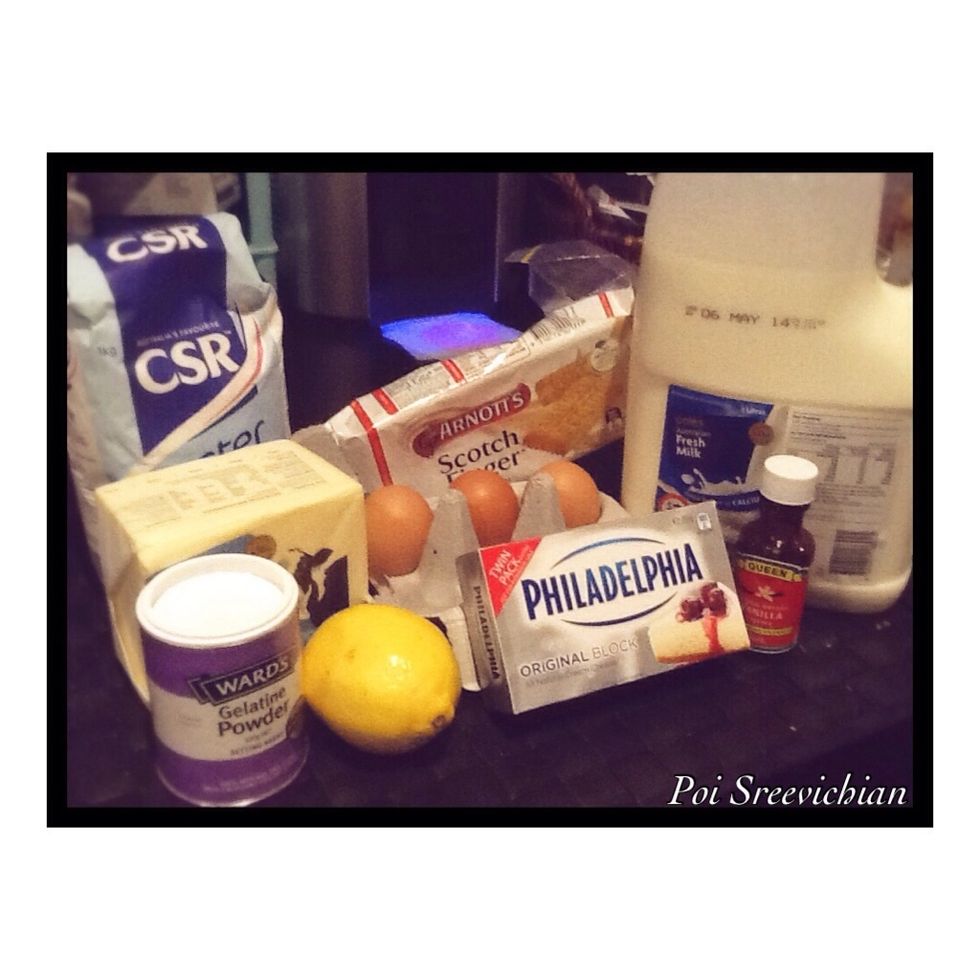 These are the Ingredients, So here ive got Caster Sugar, Butter, Gelatine Powder, a Lemon but we need to use two, 3 eggs, Scotch Fingers, Philadelphia Cream Cheese, Vanilla and Milk