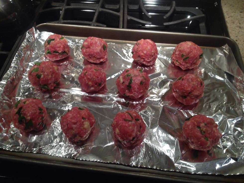 These are the meatballs formed around the mozzarella cubes.