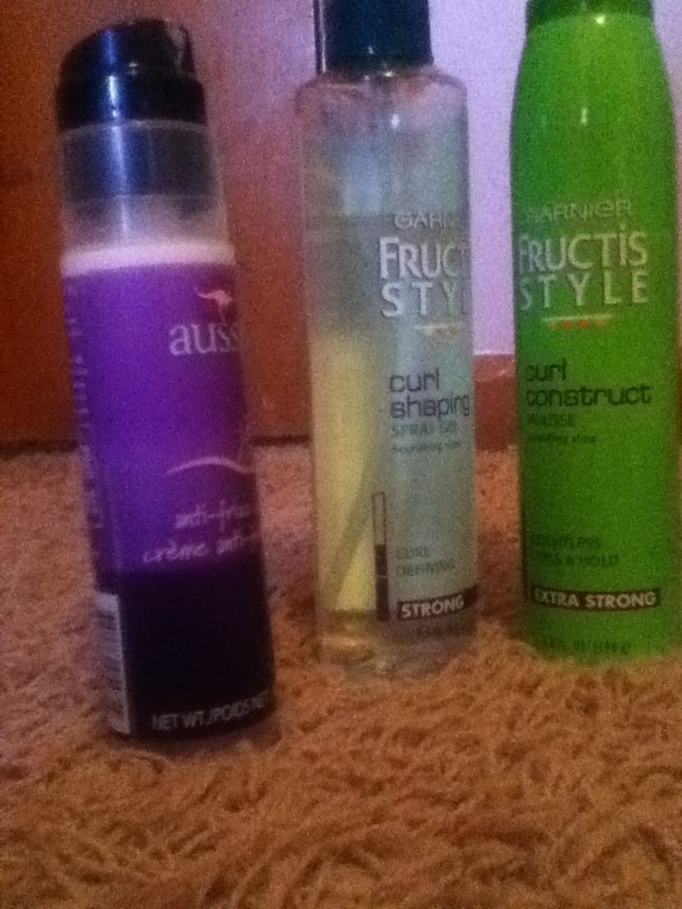 These are the Products I use ^ Left: Aussie Anti Frizz Creme  Middle: Garnier Fructis Style: Curl Shaping Spray Gel  Right: Garnier Fructis Style: Curl Construct mousse