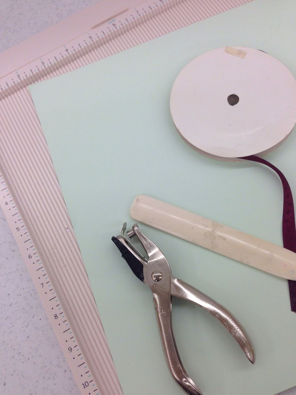 These are the supplies you need for this project. We used plain paper to show the folds better. This project works well with patterned scrapbook paper. You can use up some extra paper from your stash!