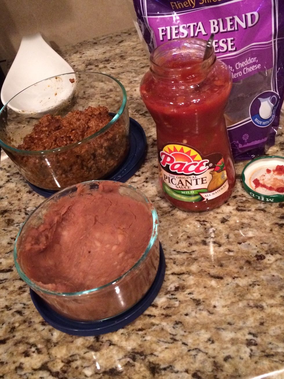 These are the supplies you use for the quesadillas...meat, refried beans, salsa and cheese