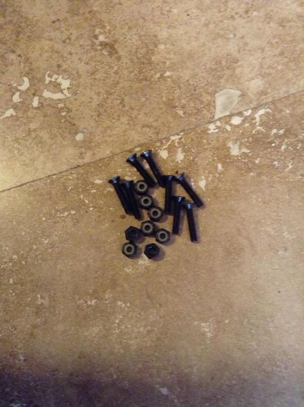 These are your screws and bolts. Eight (8) of each to be exact. I recommend a 1.25" length. Shorter screws may not fit every deck and longer screws will have too much excess if no risers are added.