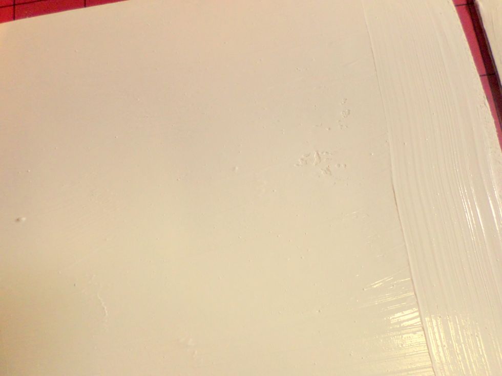 These blocks are already primed, but I added a thick layer of Gesso. I used it to get texture on my block. Gesso is thinner than Molding Paste and I love getting texture from my paint brush.