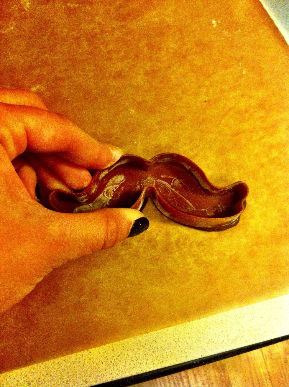 These cookie cutters are extra cool because they are also a cookie press on the front side. Dip the textured side in flour then press into cut cookie dough.