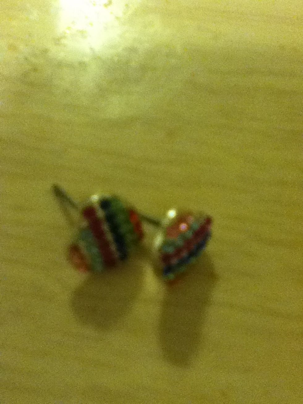 These earrings are rainbow!They should goe with details of the shirt